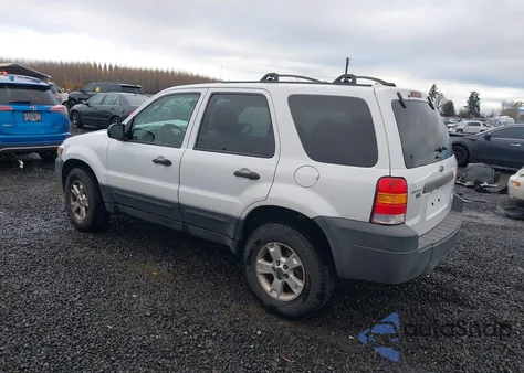 2005 Ford Escape Xlt z USA, uszkodzony, nr VIN 1FMYU93105KA05917